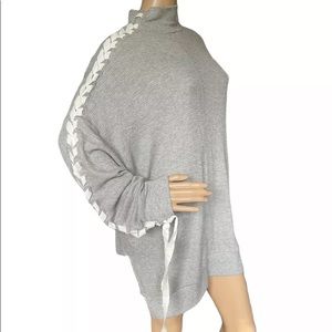 Free people movement snow drift lace up sweater. Size S